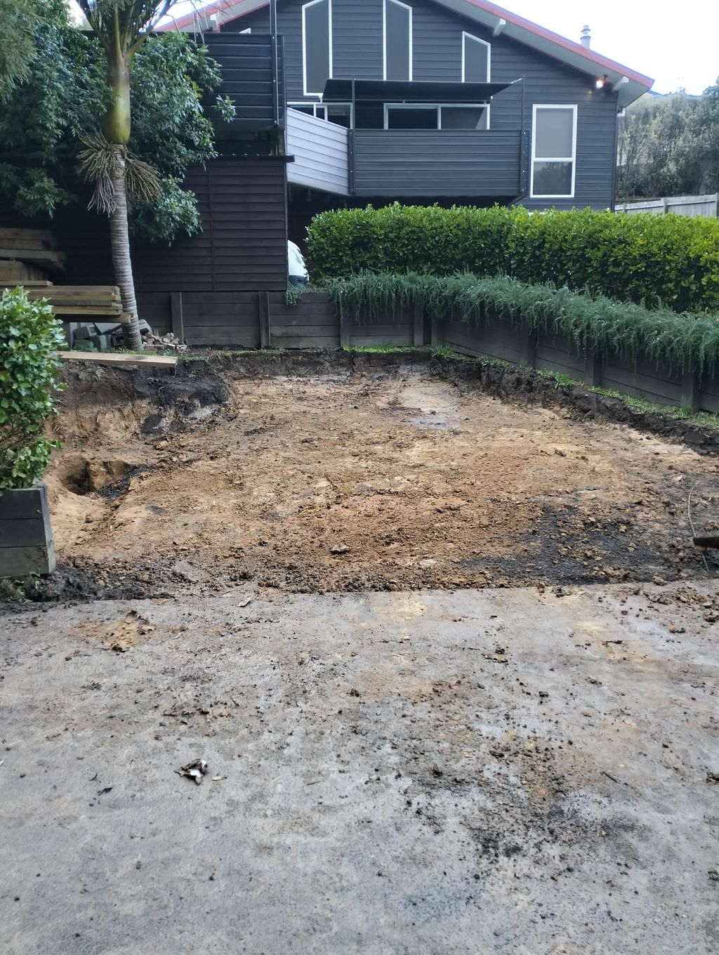 Cleared front garden with exposed ground ready for the next stage