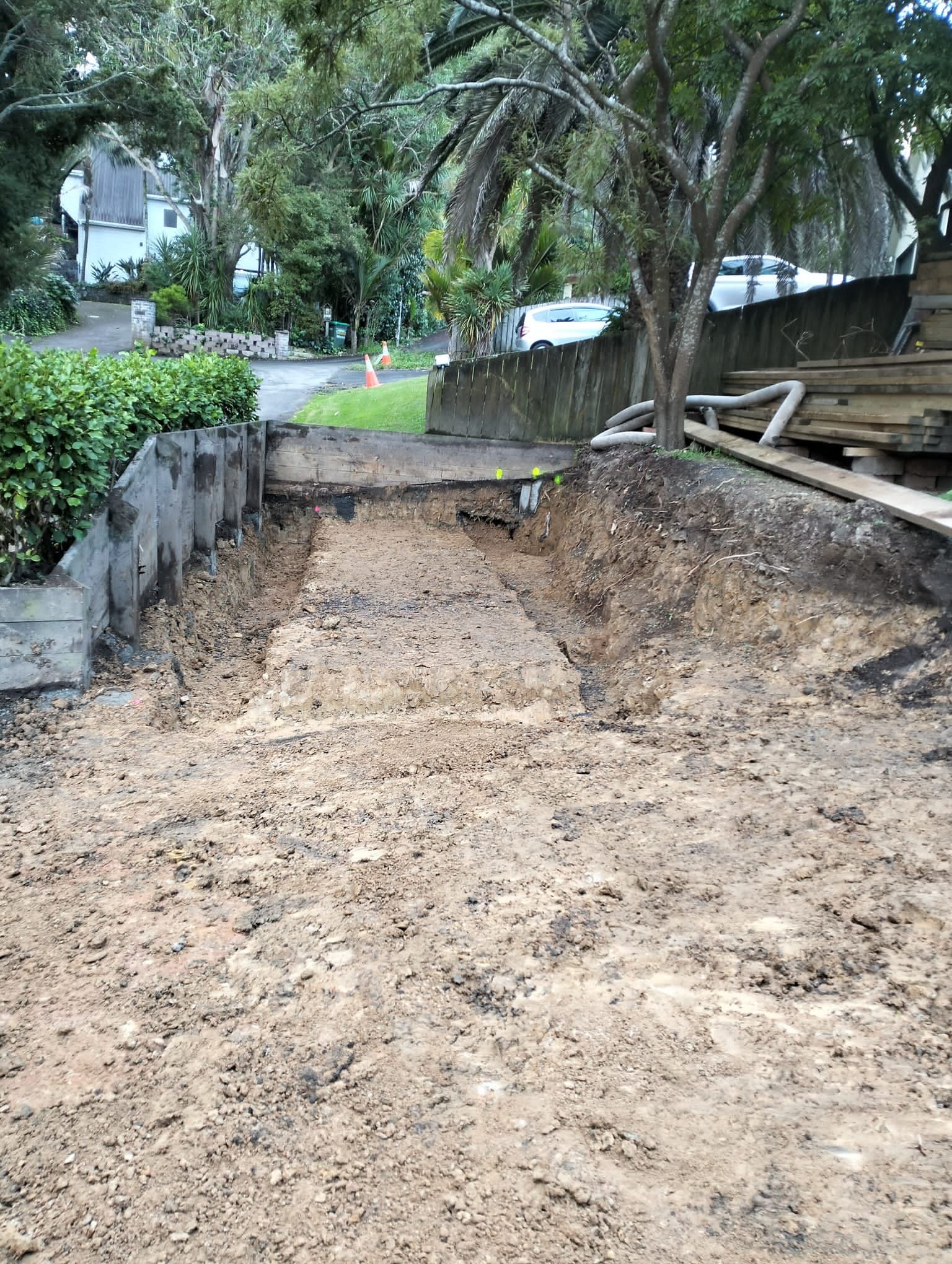 Excavated ground in a narrow side-access area